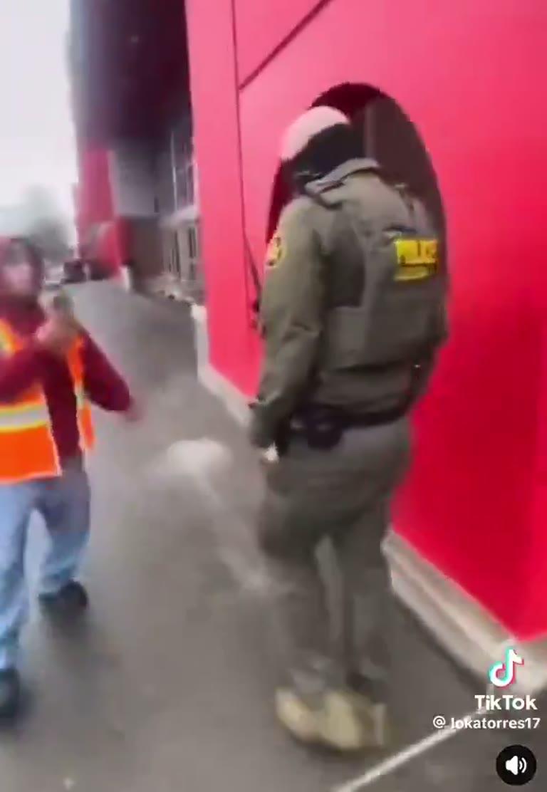 Moment of Tension Outside Takeaway as Officer Moves In