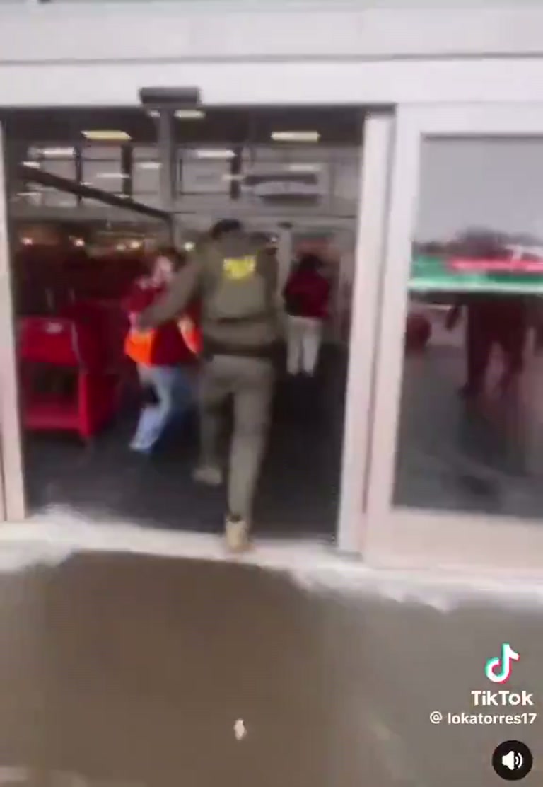 Moment of Tension Outside Takeaway as Officer Moves In